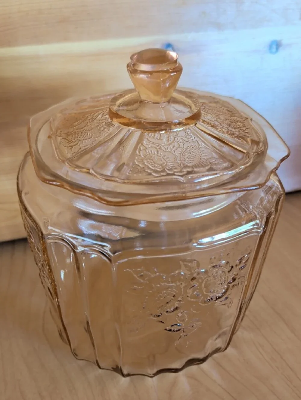 VTG. Pink Pressed Glass Cookie Jar with Lid and Floral Motif.
